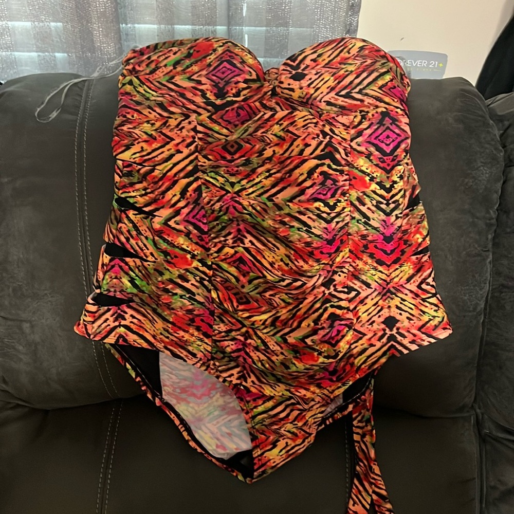 NWT. Women’s size 1X multicolored halter style bathing suit